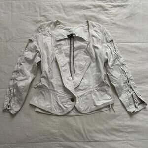 White light weight jacket with lace-up detail sleeve and sliced open detail back